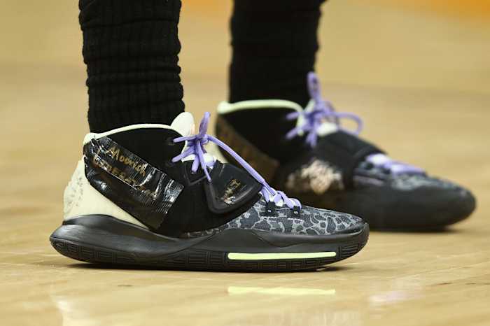 View of black Nike Kyrie shoes.